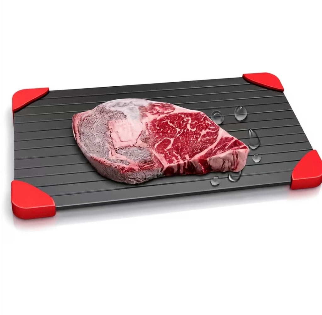 Aluminum grill tray on a white background with steak
